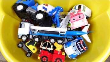 Toy Cars and Planes in a Yellow Bucket